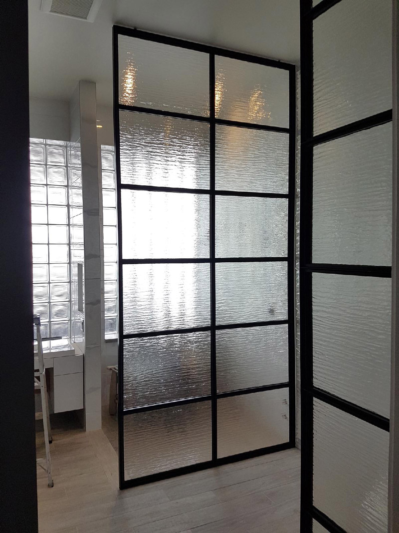 Black metal and glass shower door